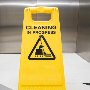 SMClean NW | Office Cleaning Chester, North Wales & Surrounding Areas | Cleaning in progress sign